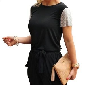 Metallic Mesh Sleeve Jersey Jumpsuit .